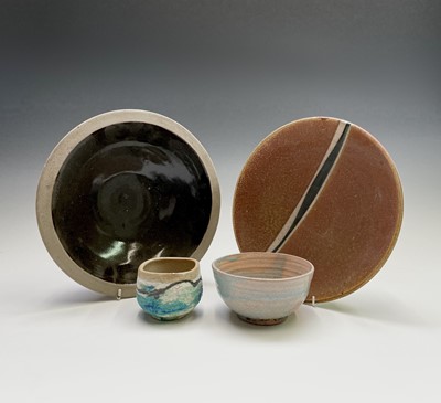 Lot 830 - A studio pottery plate with central unglazed...
