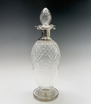 Lot 34 - A good cut glass ovoid footed decanter with...