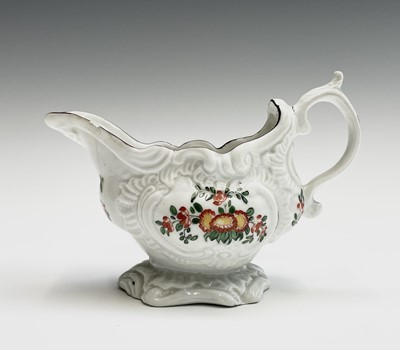 Lot 804 - A Plymouth porcelain rococo sauceboat, William...