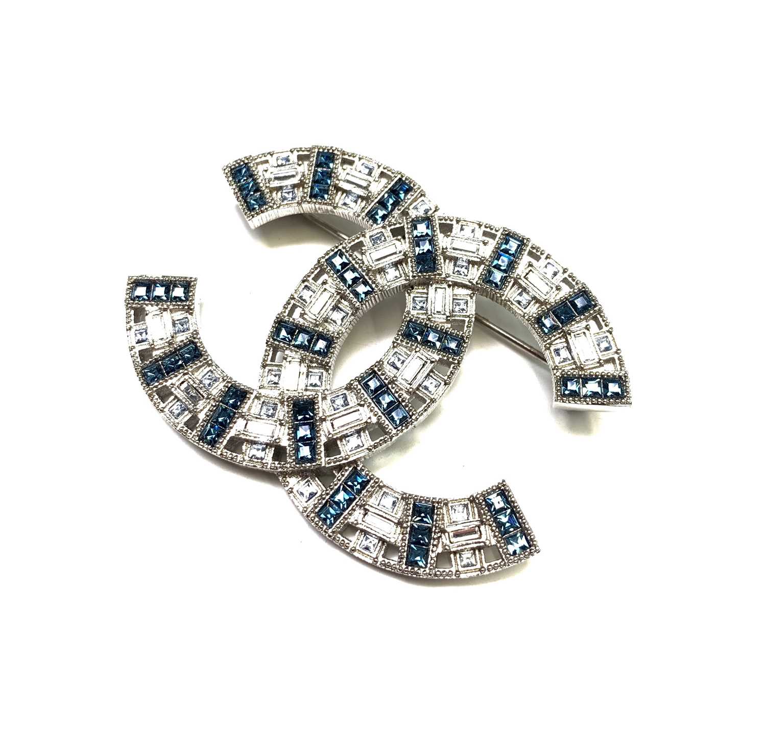 Lot 207 - Chanel brooch. Double C logo in silvertone...