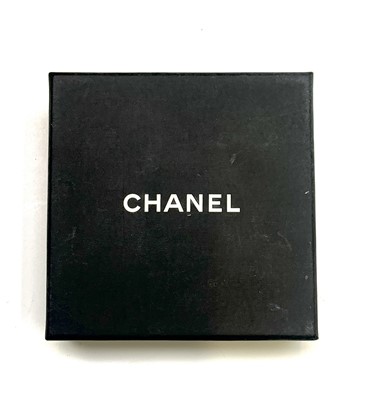 Lot 207 - Chanel brooch. Double C logo in silvertone...