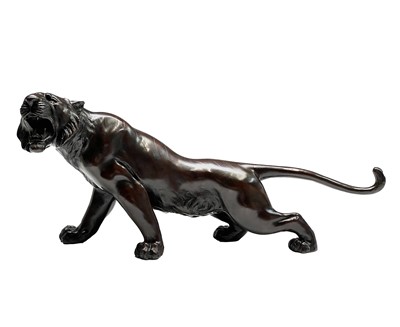 Lot 14 - A Japanese bronze model of a tiger, Meiji...
