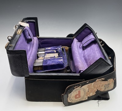 Lot 36 - An impressive black leather Gladstone type...