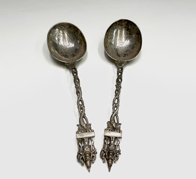 Lot 39 - A pair of Indian silver deity spoons 21cm 139.3gm