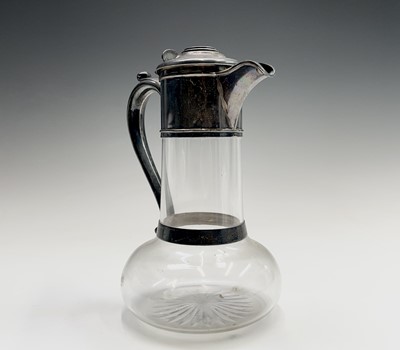 Lot 41 - A late Victorian silver mounted claret jug by...