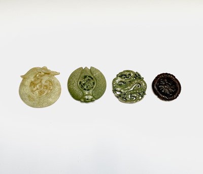 Lot 303 - A Chinese jade carved disc, 20th century,...