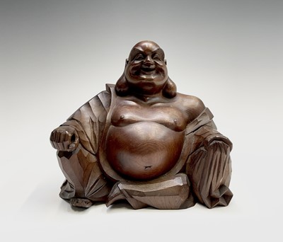 Lot 305 - A Japanese boxwood figure of a seated Buddha,...