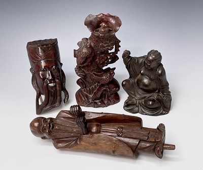 Lot 311 - A Chinese hardwood figure, carved as a bearded...