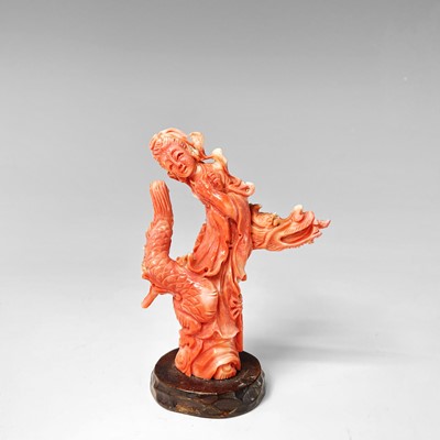 Lot 370 - A Chinese carved coral figure of Guanyin...