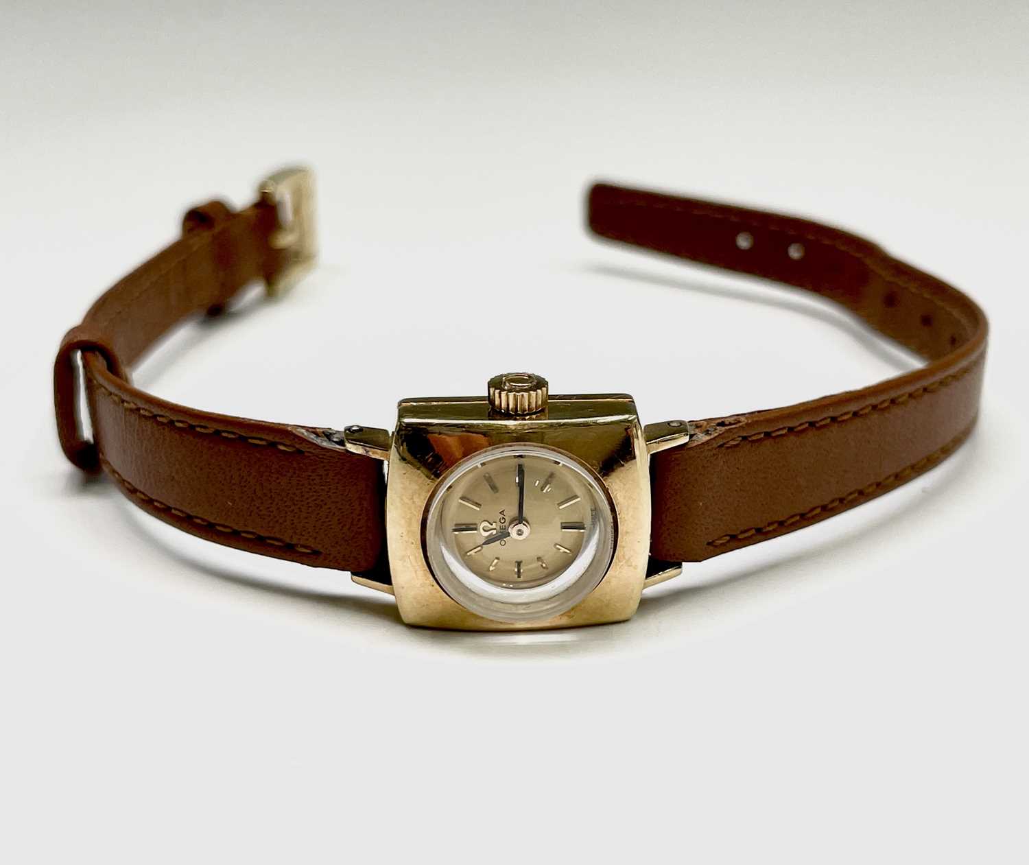 Lot 1 - A ladies square 18ct gold Omega wristwatch...
