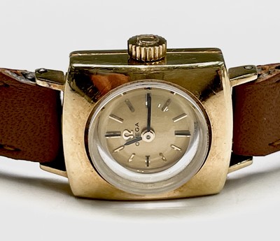 Lot 1 - A ladies square 18ct gold Omega wristwatch...