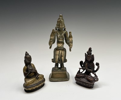 Lot 339 - A small bronze figure of a seated Buddha,...