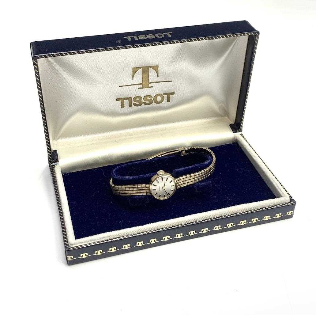 Lot 2 - A ladies 9ct gold Tissot wristwatch on 9ct...