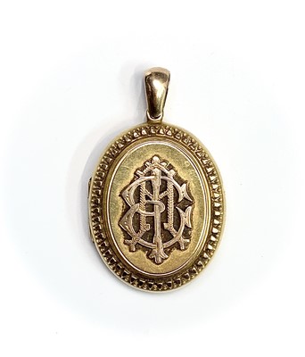Lot 195 - A Victorian gold locket 28mm wide 10.6gm