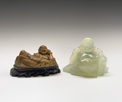 Lot 351 - A Chinese green stone figure of Buddha, 20th...