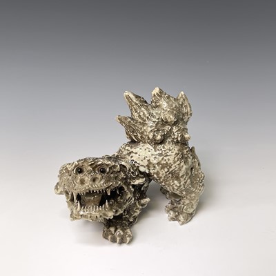 Lot 373 - A Japanese Hagi ware dog of fo, early 20th...