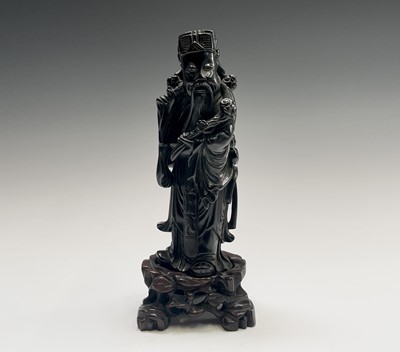 Lot 379 - A Chinese hardwood figure of an immortal, late...