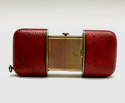 Lot 12 - A Hermes 15 jewel purse timepiece in gold...