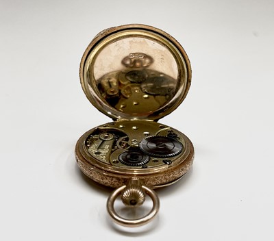 Lot 3 - A 12ct ladies gold keyless open face fob watch...