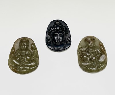 Lot 386 - A Chinese jade amulet, 20th century, carved...
