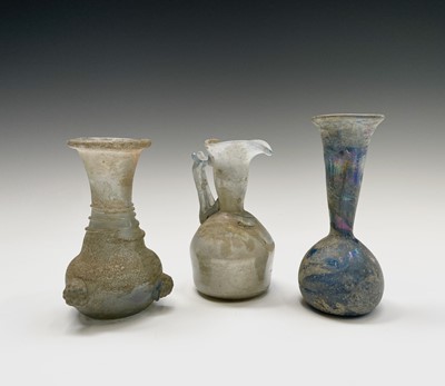 Lot 15 - Three iridescent glass vessels, possibly Roman,...