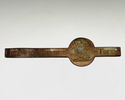 Lot 18 - A tin strap ingot reproduced from an old mould,...