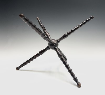 Lot 12 - A turned mahogany cat, 19th century, with...