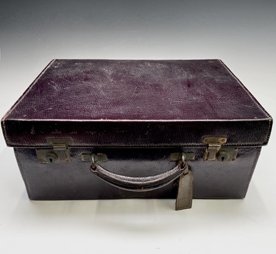 Lot 32 - A purple leather toilet case by Mappin and...