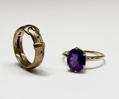 Lot 218 - A 9ct gold buckle ring 4.9gm Size O together...
