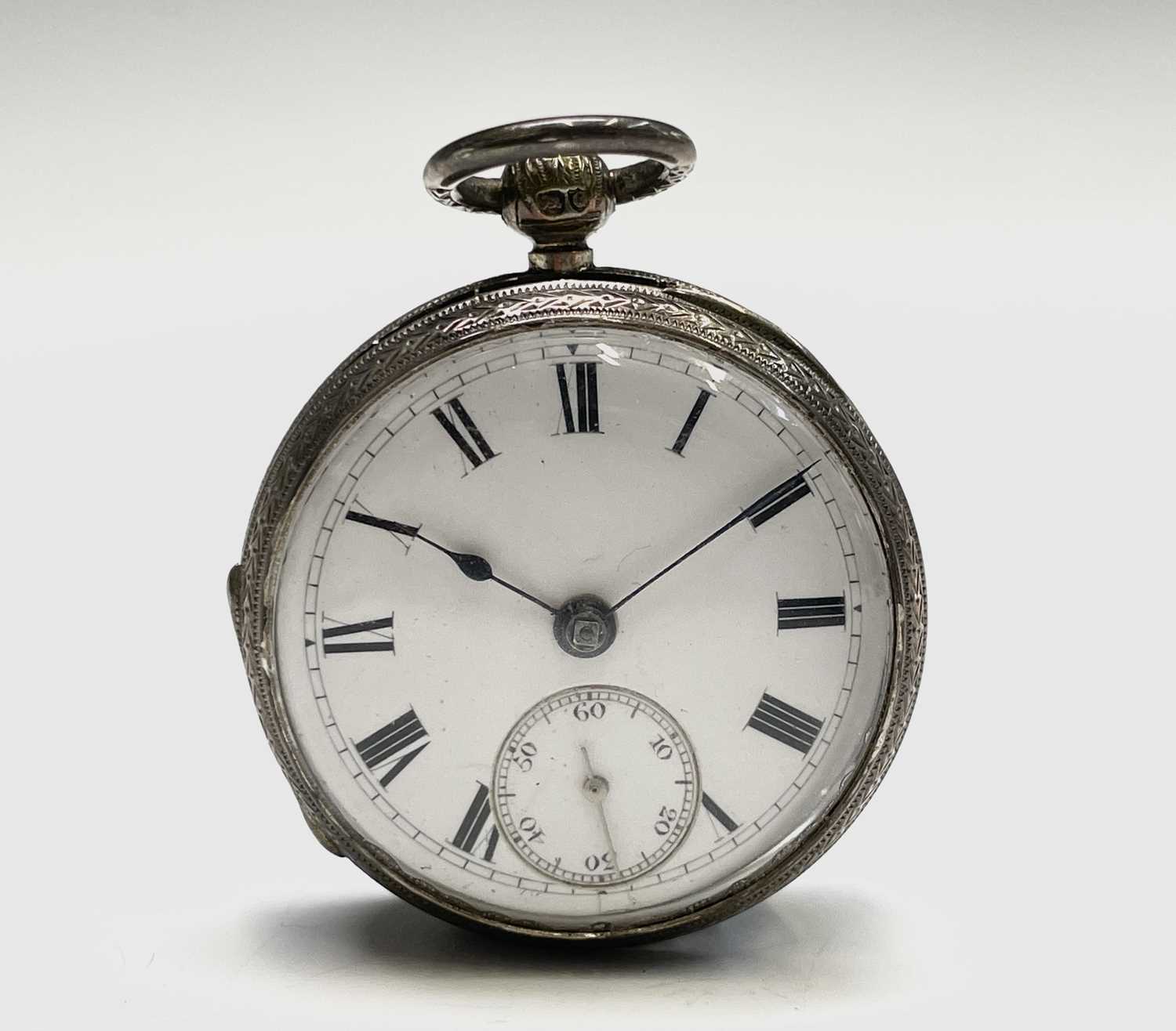 Lot 23 - A Victorian chased silver cased small open...
