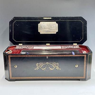 Lot 189 - A late 19th century Swiss music box, playing...