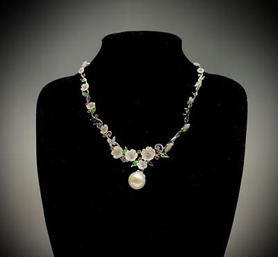 Lot 230 - An opulent floral necklace set in silver with...