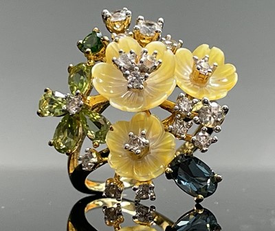 Lot 247 - Jardin flower ring with carved yellow...