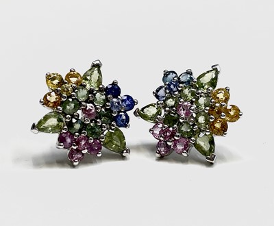 Lot 251 - A pair of multi-coloured sapphire earrings set...