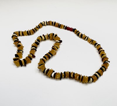 Lot 256 - An amber necklace 45.6gm