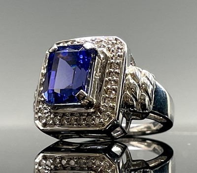 Lot 269 - An 18ct white gold ring set an AAAA tanzanite...