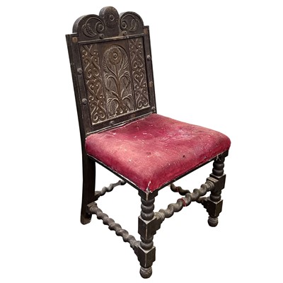 Lot 18 - A carved oak side chair, early 18th century.