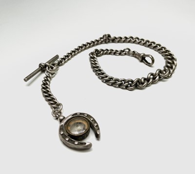 Lot 359 - An Edwardian silver graduated curb link watch...