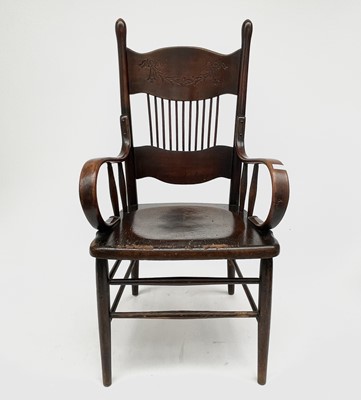 Lot 3228 - An American walnut armchair, circa 1900,...
