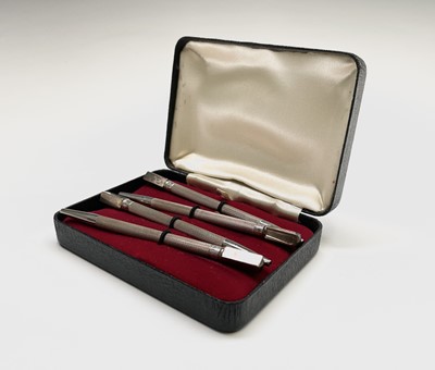 Lot 152 - A set of four silver bridge pencils, each...
