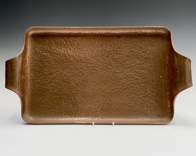 Lot 142 - An Arts and Crafts planished copper tray,...