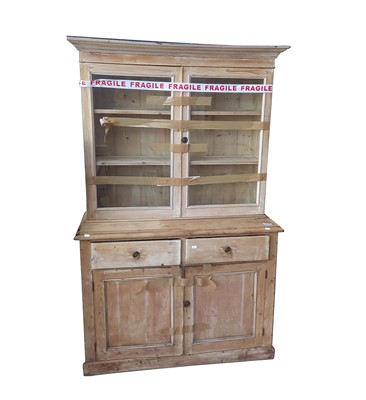 Lot 3106 - A pine kitchen dresser/bookcase, circa 1900,...