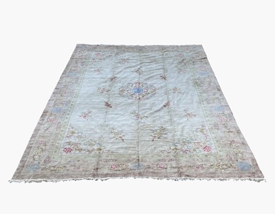Lot 1215 - A large Chinese carpet, 20th century, with a...