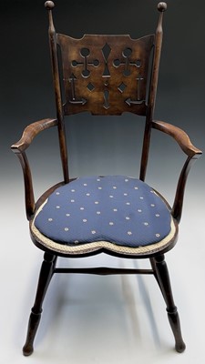 Lot 3195 - An Arts and Crafts walnut open armchair, the...