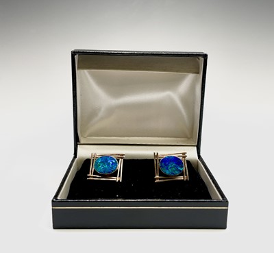 Lot 366 - A pair of 10ct gold opal set cuff-links 10.8gm
