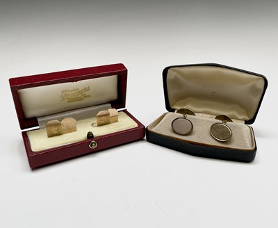 Lot 368 - Two pairs of 9ct gold engine-turned cufflinks...