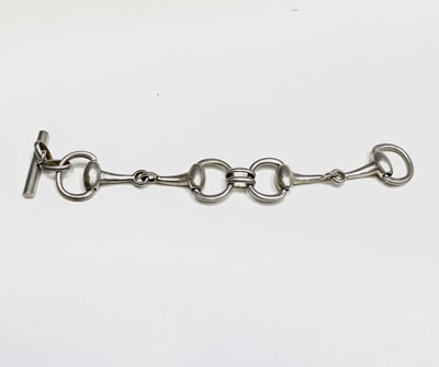 Lot 292 - A silver snaffle bit 19cm bracelet 52.9gm