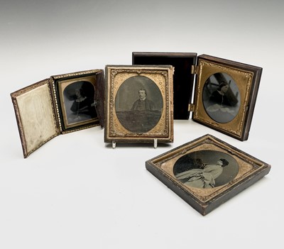 Lot 129 - An Ambrotype of a Victorian lady, heightened...