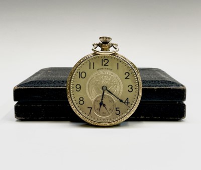 Lot 27 - A gold-plated Hamilton keyless pocket watch...