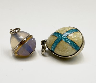 Lot 313 - A gold-mounted miniature opal and crystal egg...